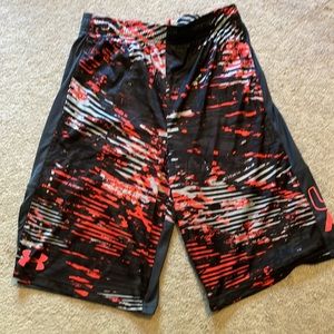 Youth large under armour shorts in cool pattern.